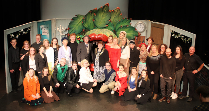 The cast and production team on the set of Little Shop of Horrors