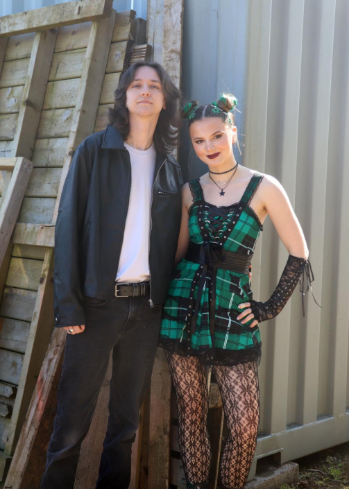 the cast of "We Will Rock You" in costume for a promotional photo-shoot.