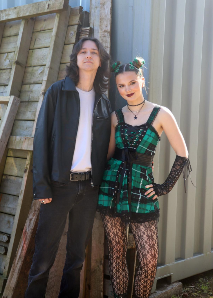 the cast of "We Will Rock You" in costume for a promotional photo-shoot.
