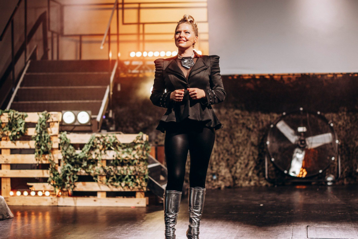 a scene from "We Will Rock You" photographed live on stage