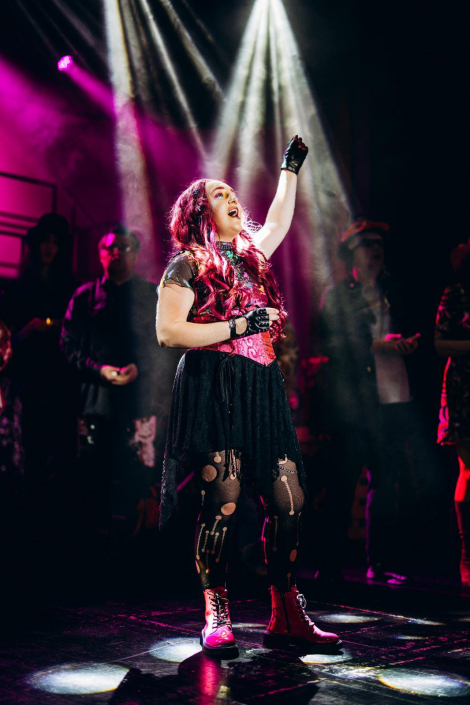 a scene from "We Will Rock You" photographed live on stage