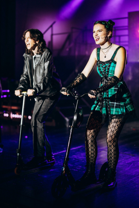 a scene from "We Will Rock You" photographed live on stage