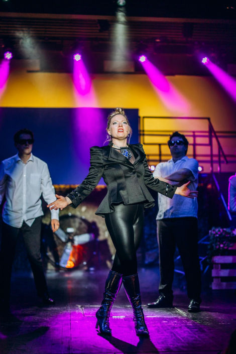 a scene from "We Will Rock You" photographed live on stage