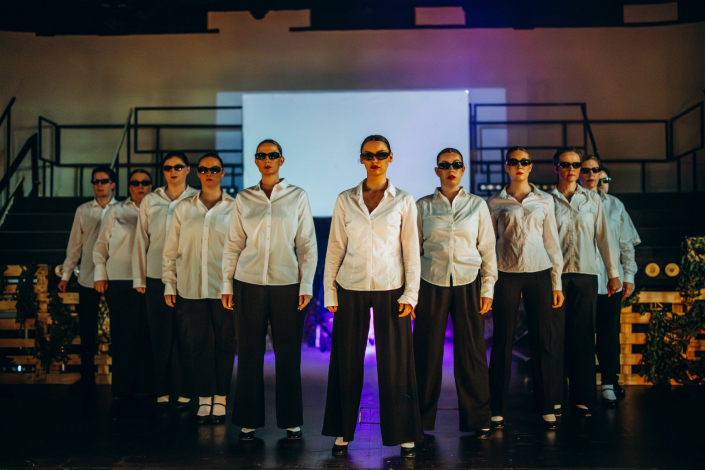 a scene from "We Will Rock You" photographed live on stage